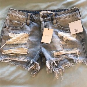 Ripped boyfriend shorts
